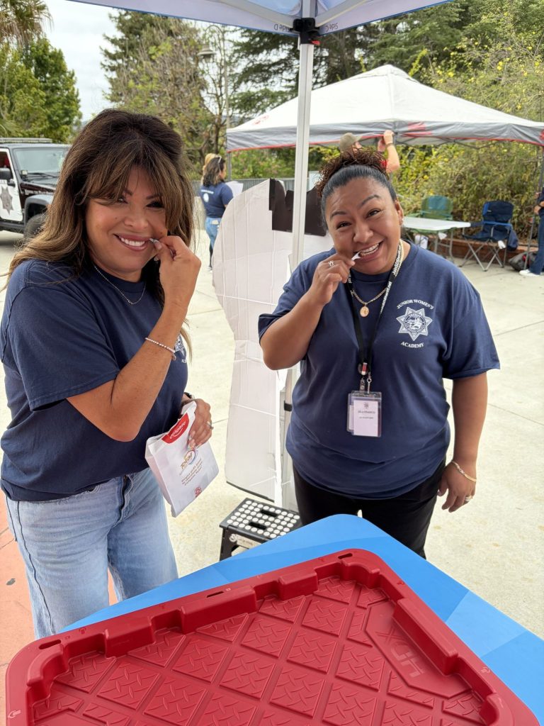 San Marcos Smile Dental staff demonstrating proper flossing techniques